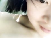 饥渴村妇和小伙在家里后面的竹林里直播偷情